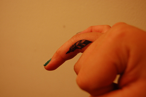 fuckyeahtattoos: New tattoo. A quill on my right ring finger.